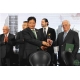 7--Mr. Lu presents the emblem to Mr. Adnan Kassar
