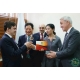 5 SRCIC Chairman LU Jianzhong presents souvenirs to Mr. Stanislav Voskresensky, Deputy Minister of Economic Development of the Russian Federation